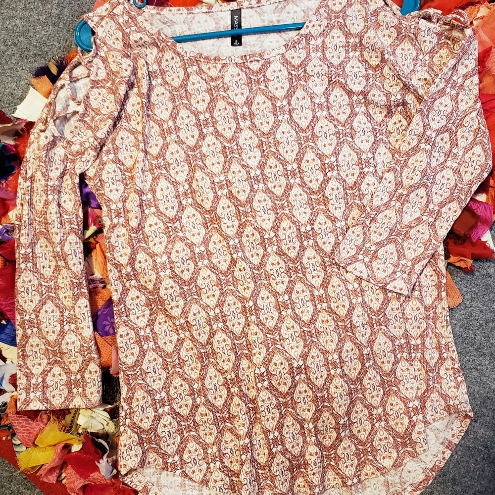 Long sleeved top with lace up arm detail